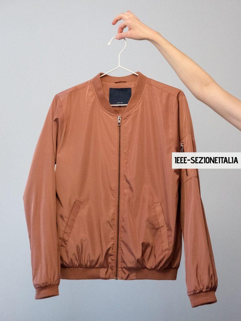 brown long sleeve shirt on white clothes hanger